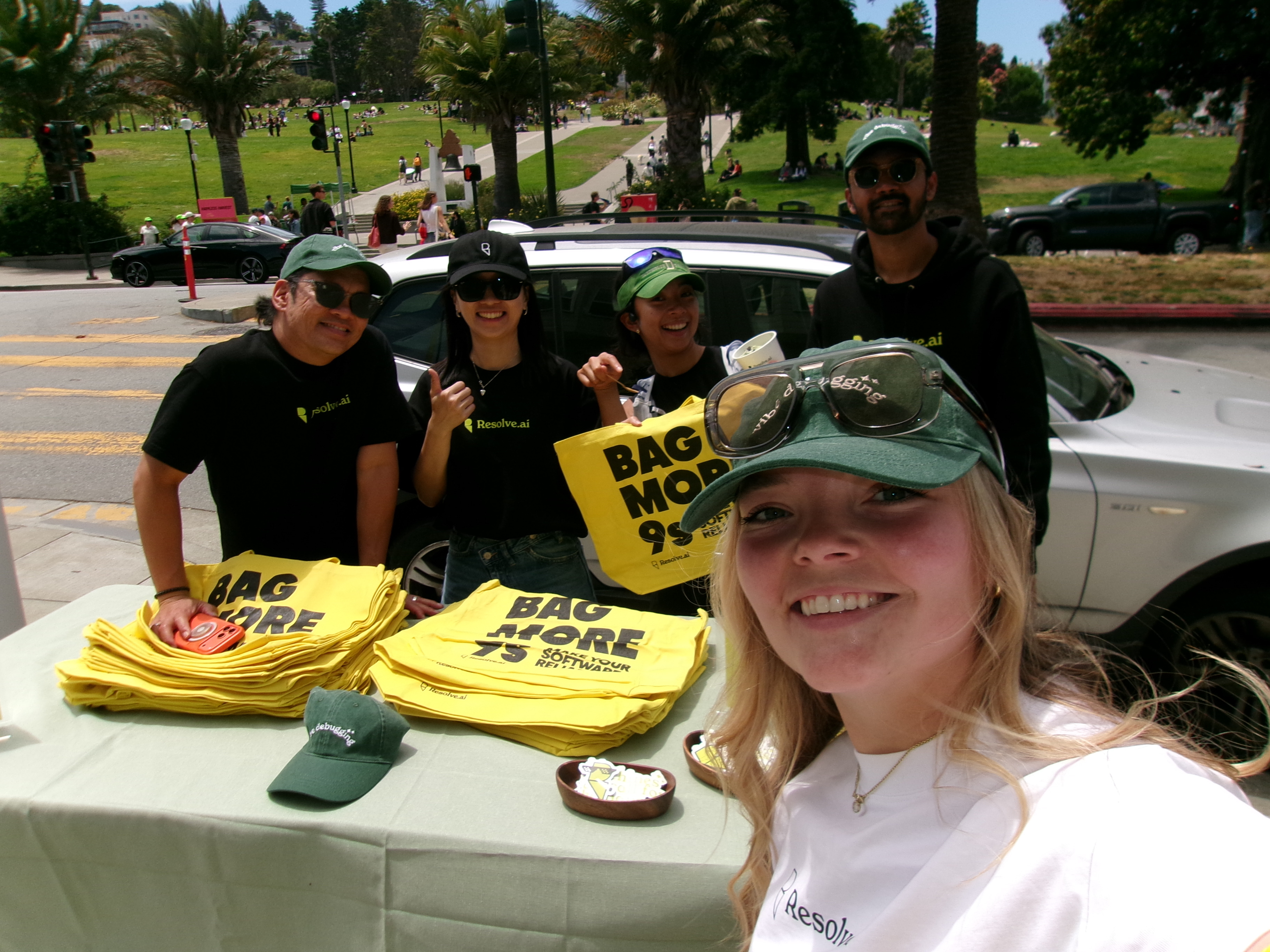 Resolve AI team handing out Bag More 9s totes at Dolores Park